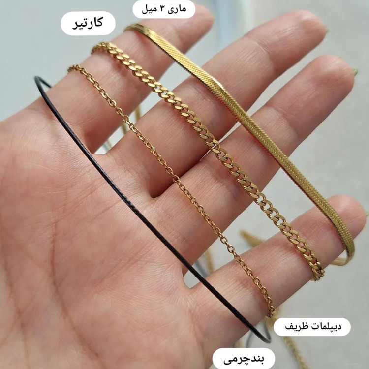 لاکت استیل طلایی طرح تاج با دو عکس داخلی رزینی پرسو گالری